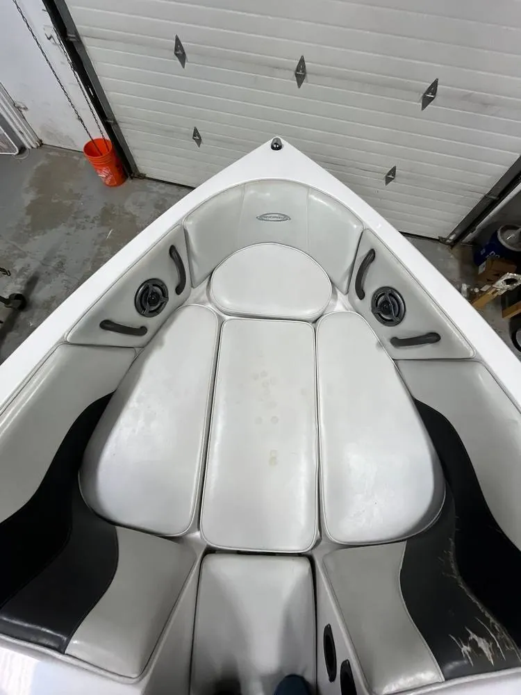Before: Moomba bow seating in aged gray vinyl