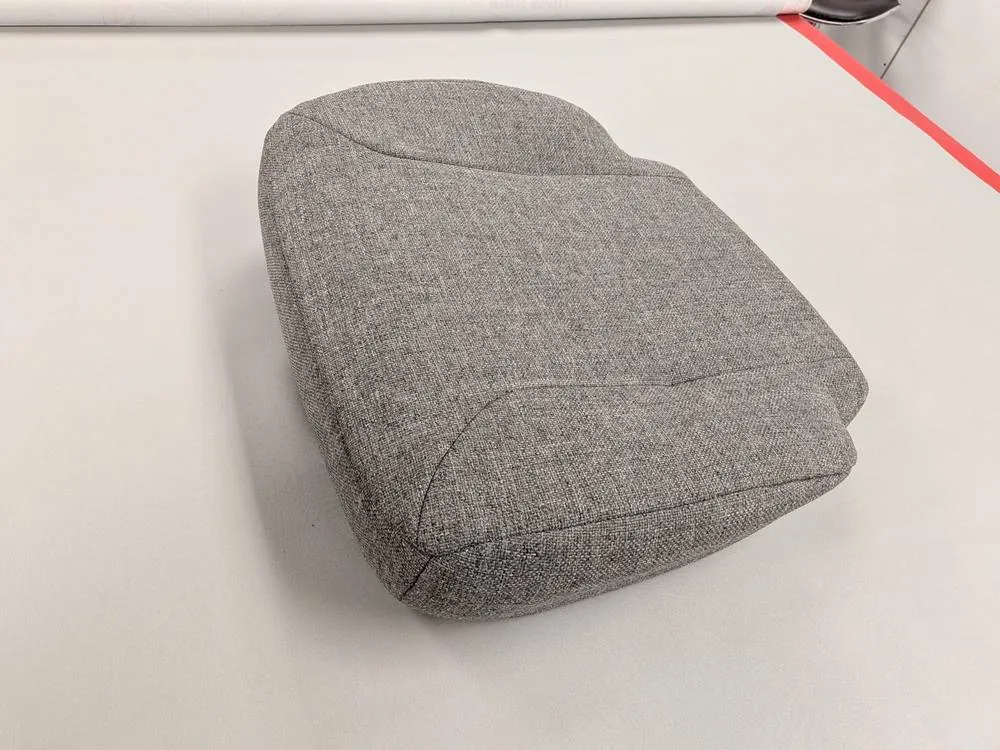 After: Seat cushion recovered in new gray tweed fabric